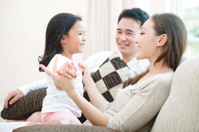Happy Asian Family Playing
