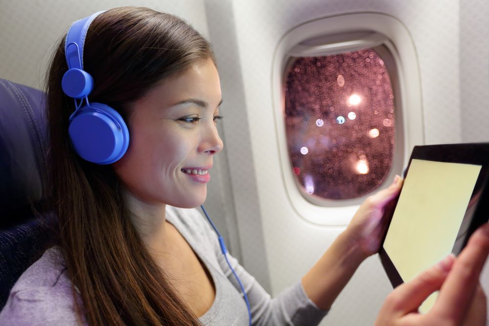 cách đi máy bay không bị ù tai